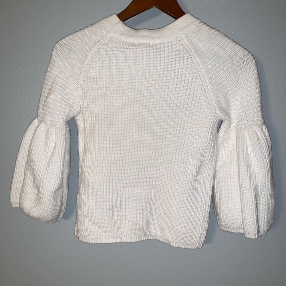 White thick knitted blouse